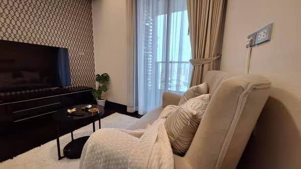 bedroom and living room of The Lumpini 24