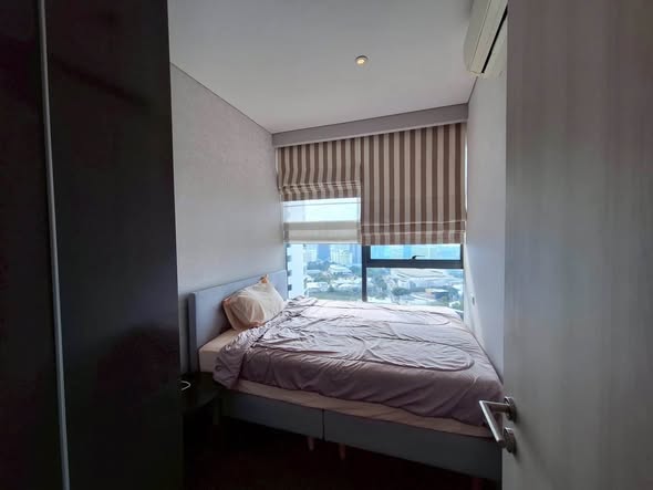 bedroom and room interior of The Lumpini 24
