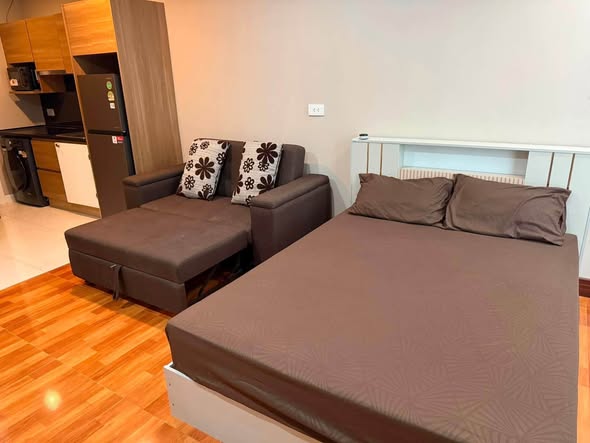 bedroom of The Metropolis Samrong