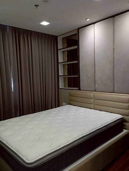 bedroom of The Metropolis Samrong