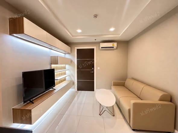 bedroom of The Metropolis Samrong