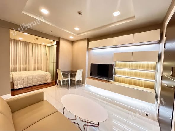 bedroom of The Metropolis Samrong
