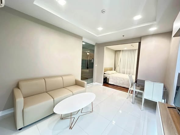living room and bedroom of The Metropolis Samrong