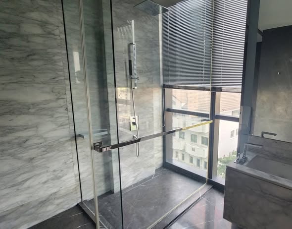 room interior and bathroom of The Monument Thong Lo