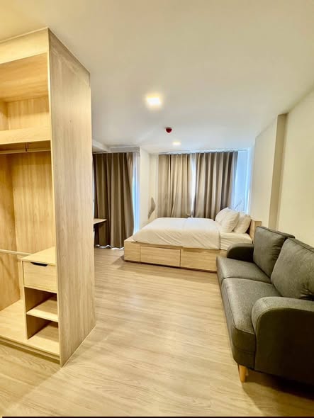 bedroom and room interior of THE MUVE Sukhumvit 107