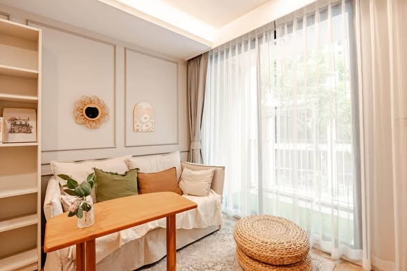 bedroom and living room of The Nest Ploenchit