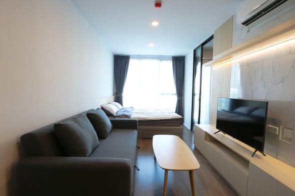 bedroom and living room of The Origin Ratchada-Lat Phrao