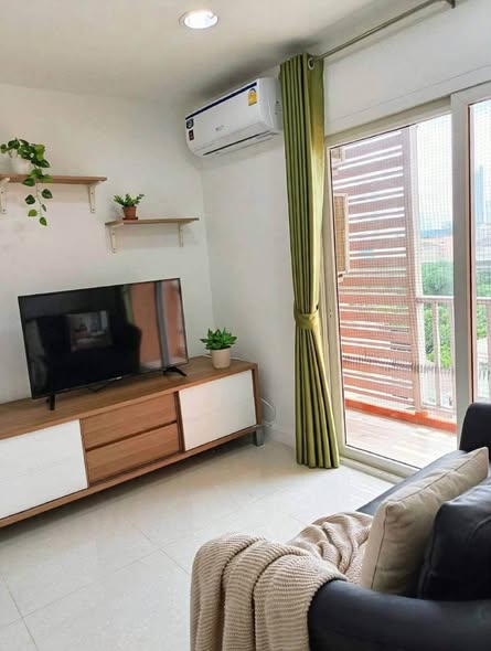 living room and bedroom of The Plenary Sathon