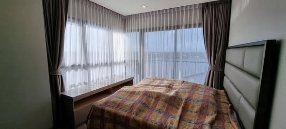 bedroom of The Politan Aqua