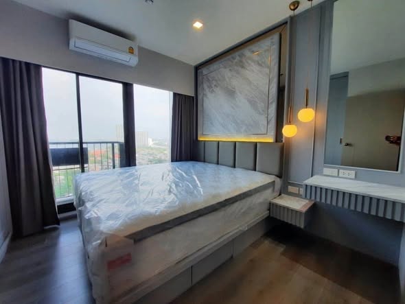 bedroom of The Politan Aqua