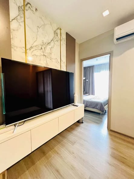 bedroom and living room of The Politan Aqua