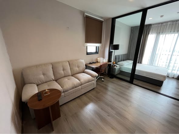bedroom and living room of The Politan Rive