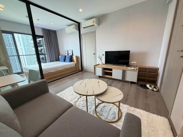 living room and bedroom of The Politan Rive
