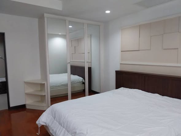 bedroom of The Prime 11 Condo
