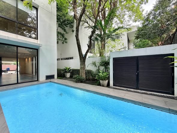 pool and room interior of The Private House Pool Villa