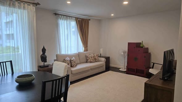 bedroom and living room of The Private Residence Rajdamri