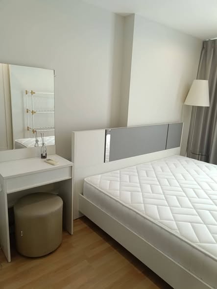 bedroom of The Raffles Condominium
