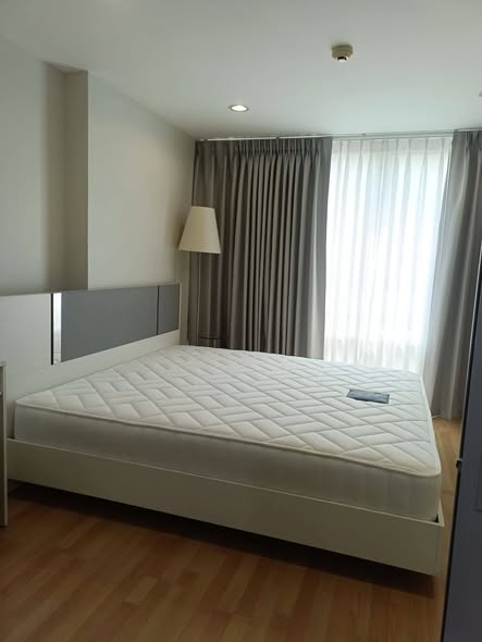 bedroom of The Raffles Condominium