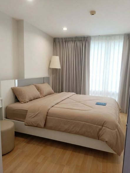 bedroom of The Raffles Condominium