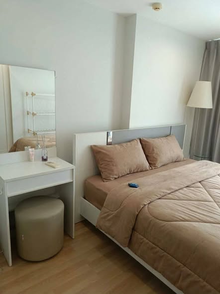 bedroom of The Raffles Condominium