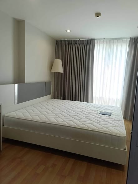 bedroom of The Raffles Condominium