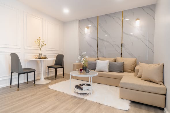 living room of The Raffles Condominium