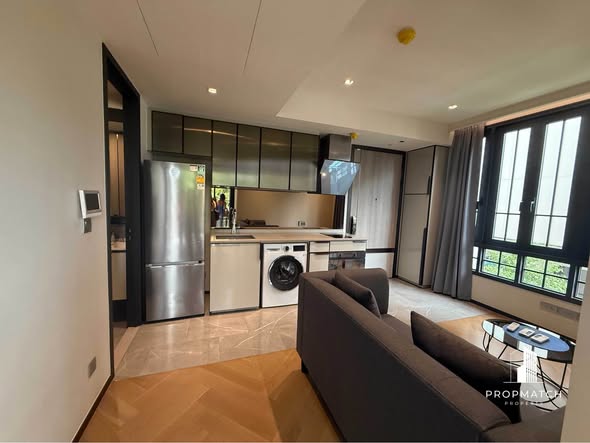 living room and room interior and kitchen of The Reserve Sukhumvit 61
