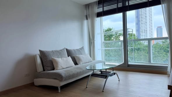 bedroom and living room of The River Condominium