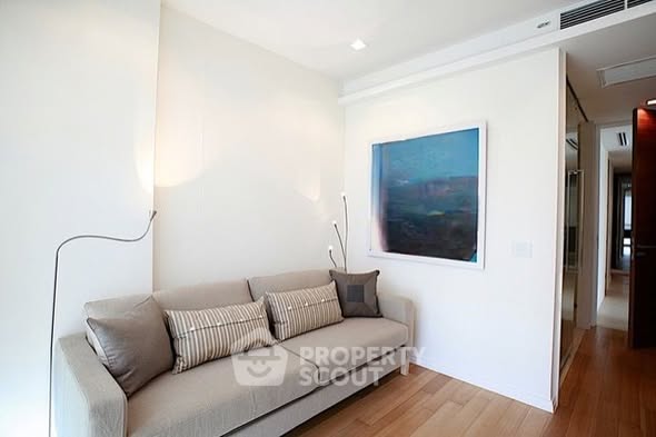 living room and bedroom of The River Condominium