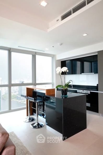 living room and kitchen of The River Condominium