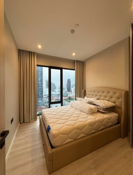 bedroom of The Room Phaya Thai