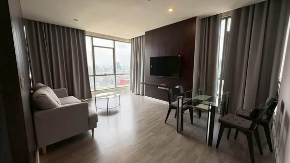 living room and bedroom of The Room Rama 4