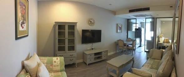 living room and bedroom of The Room Sathon
