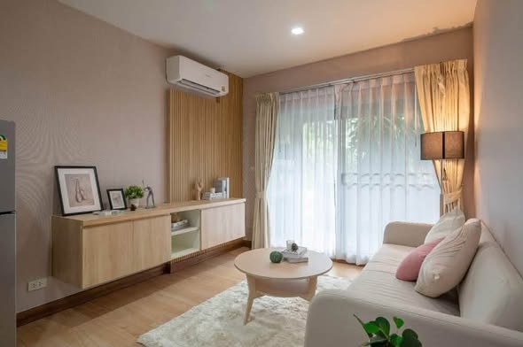 bedroom and living room of the seed musee sukhumvit 26