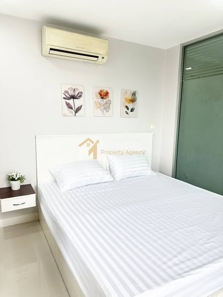 bedroom of The Station Condo