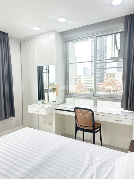 bedroom of The Station Condo