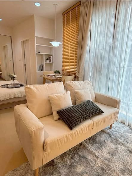 living room and bedroom of The Tempo Ratchada