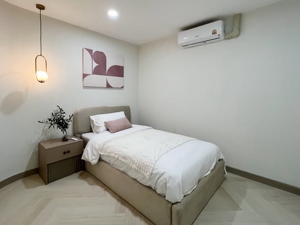 bedroom of The Trio Garden