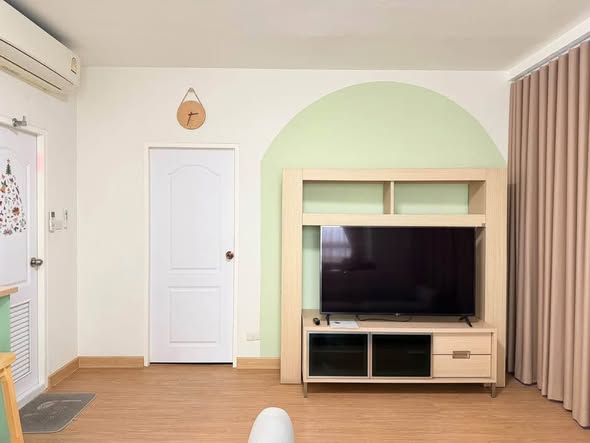 bedroom and living room of The Zest Condominium