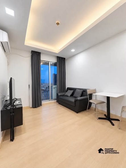 bedroom and living room of Thru Thong Lor