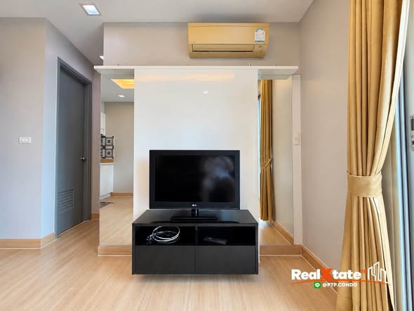bedroom and living room of Thru Thong Lor