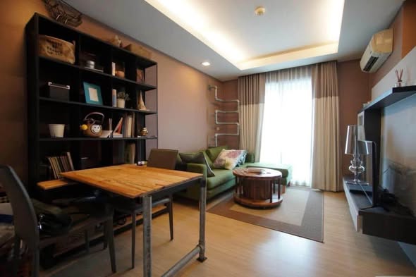 bedroom and living room of Thru Thong Lor