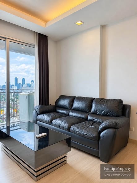bedroom and living room of Thru Thong Lor