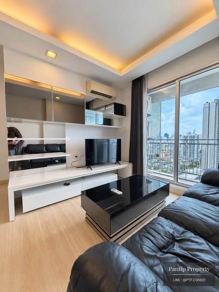 living room and bedroom of Thru Thong Lor
