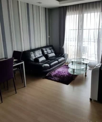 living room and bedroom of Thru Thong Lor