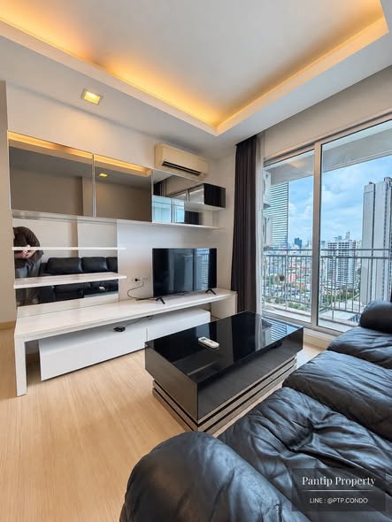 living room and bedroom of Thru Thong Lor