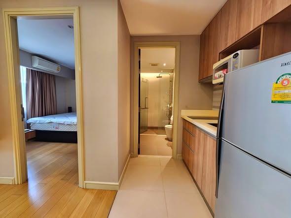 bedroom of Tidy Deluxe Condominium