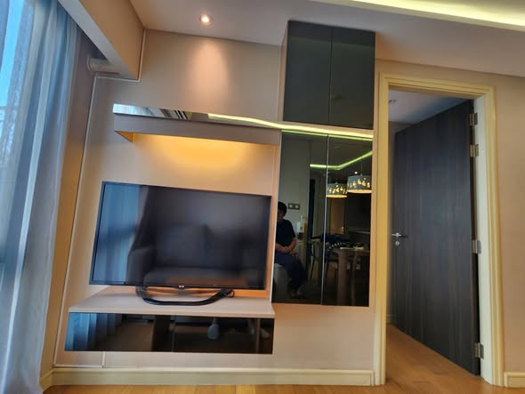 bedroom and room interior of Tidy Deluxe Condominium
