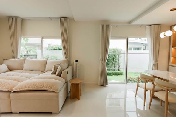 living room and bedroom of Villaggio 3 Srinakarin-Bangna