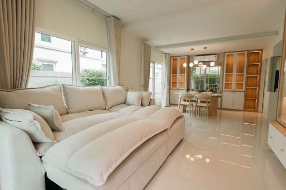 living room and bedroom of Villaggio 3 Srinakarin-Bangna
